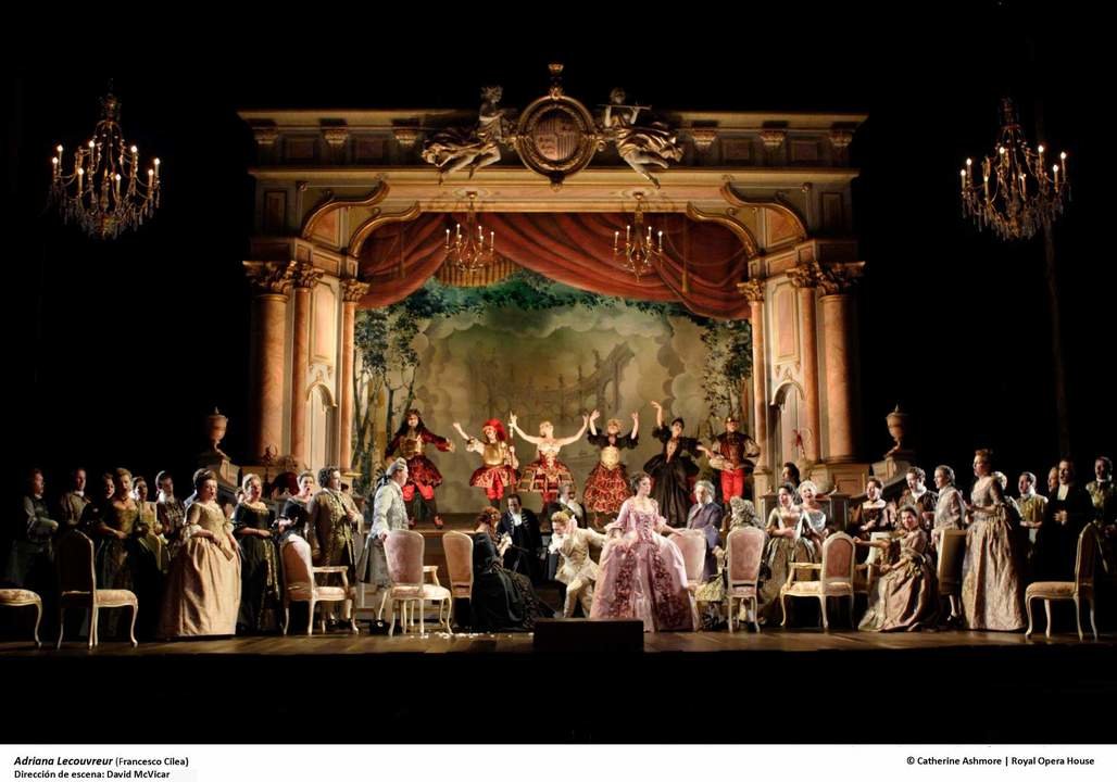 The end of the ballet in Act III with Angela Gheorghiu as Adriana in the foreground of the Royal Opera production of Adriana Lecouvreur by Francesco Cilea (1866-1950) directed by David McVicar  with set designs by Charles Edwards, costume designs by Brigitte Reiffenstuel and lighting designs by Adam Silverman, performed at the Royal Opera House, Covent Garden in November 2010.

ARPDATA ; 

ADRIANA LECOUVREUR ;

Music by Cilea ;

The end of the ballet in Act III, Angela Gheorghiu (as Adriana Lecouvreur) ; 

The Royal Opera ; 

At the Royal Opera House, London, UK ; 

November 2010 ; 

Credit: Catherine Ashmore / Royal Opera House / ArenaPAL ;